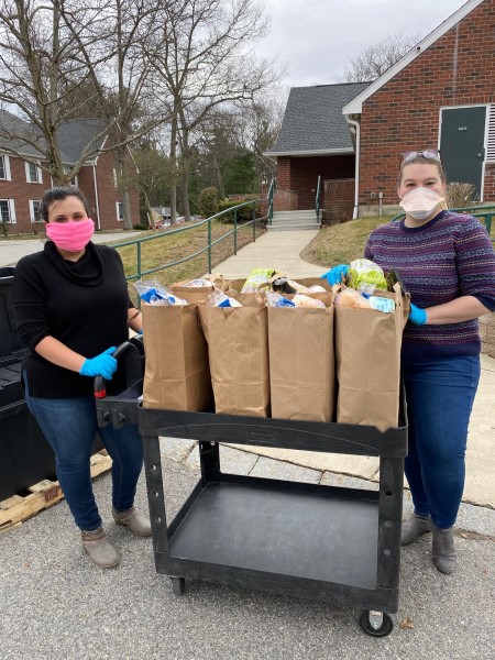 Pictured is HHA Executive Director Jackie Beaulieu and HHA Program Administrator Madison Waterman making the first round of deliveries at Norma Oliver Village